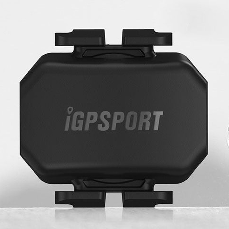 Sensor de cadencia iGPSPORT CAD70, cuerpo negro con la marca impresa y pestañas laterales para la goma de montaje.
